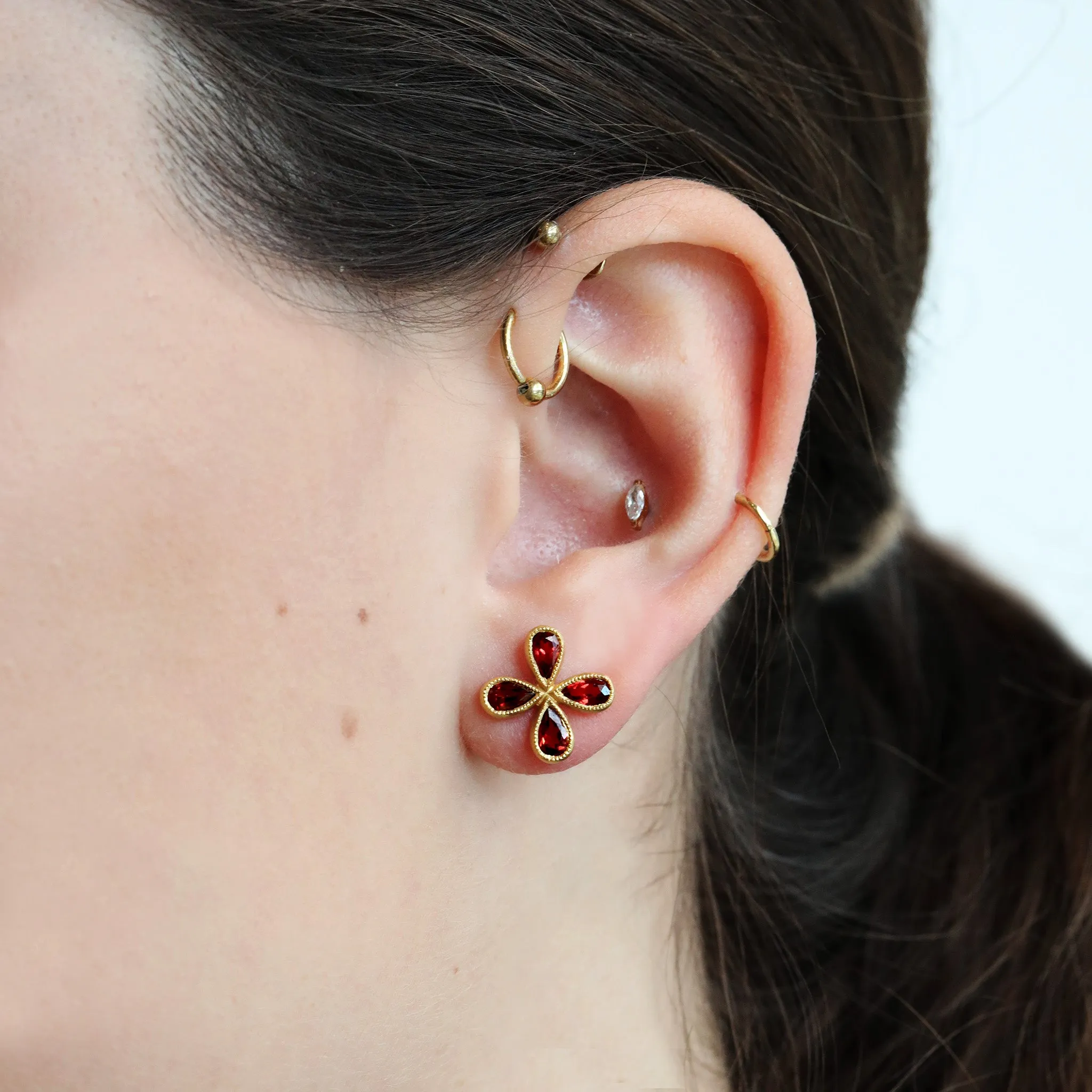 22K Gold Garnet Star Post Earrings with Milgrain Details